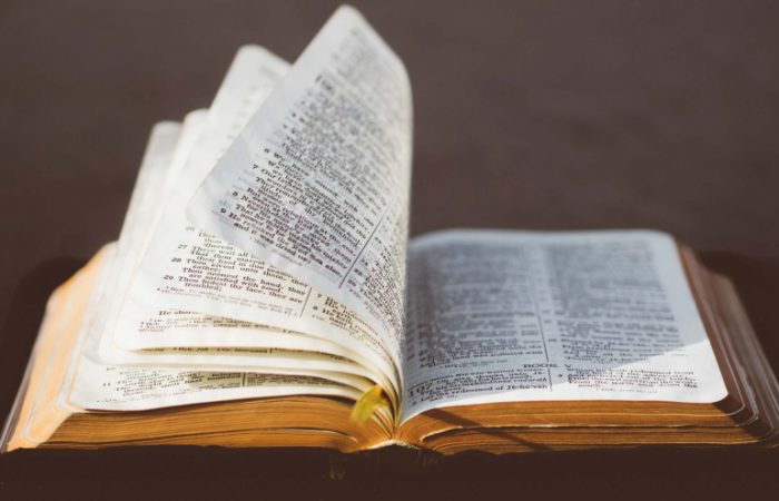 An Image of Holy Bible placed on the table.